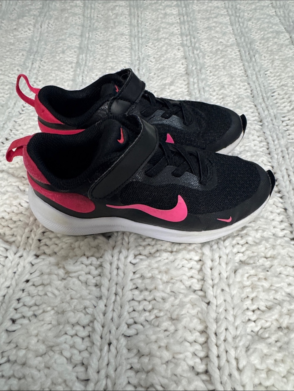Nike Kids Black Sneakers with Pink Swoosh
